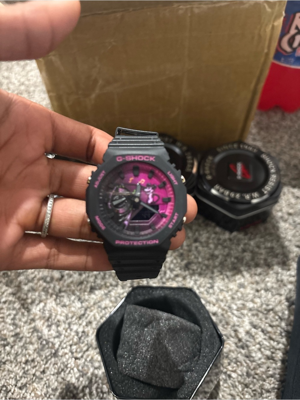 G-Shock Men's Black Watch with Pink Dial Accents